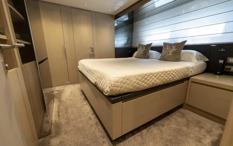  Yacht Photos Pics Luxurious bedroom interior of 2018 Sanlorenzo SL86 yacht with modern design and cozy bedding.