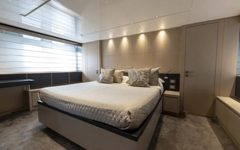  Yacht Photos Pics Luxurious bedroom interior of 2018 Sanlorenzo SL86 yacht with modern design and ambient lighting.