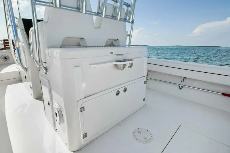 Yacht Photos Pics 2012 Regulator 32 FS boat interior with seating and ocean view.