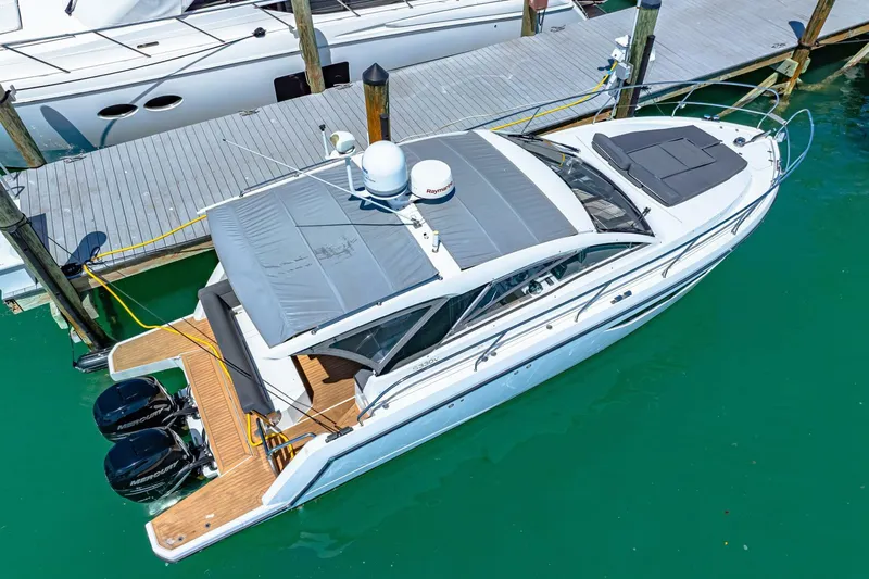  Yacht Photos Pics 2019 Sealine S330V yacht docked in marina, aerial view.