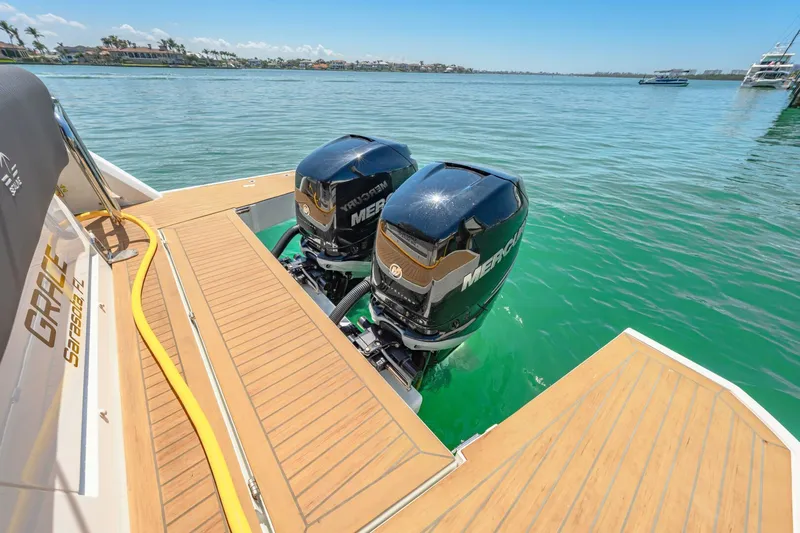  Yacht Photos Pics 2019 Sealine S330V boat with twin Mercury outboard engines on a sunny day.