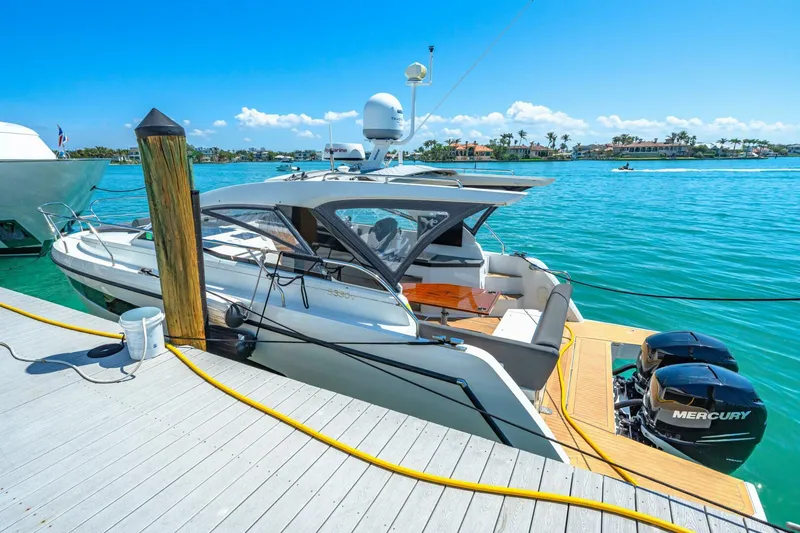  Yacht Photos Pics 2019 Sealine S330V yacht docked with twin Mercury outboard engines.