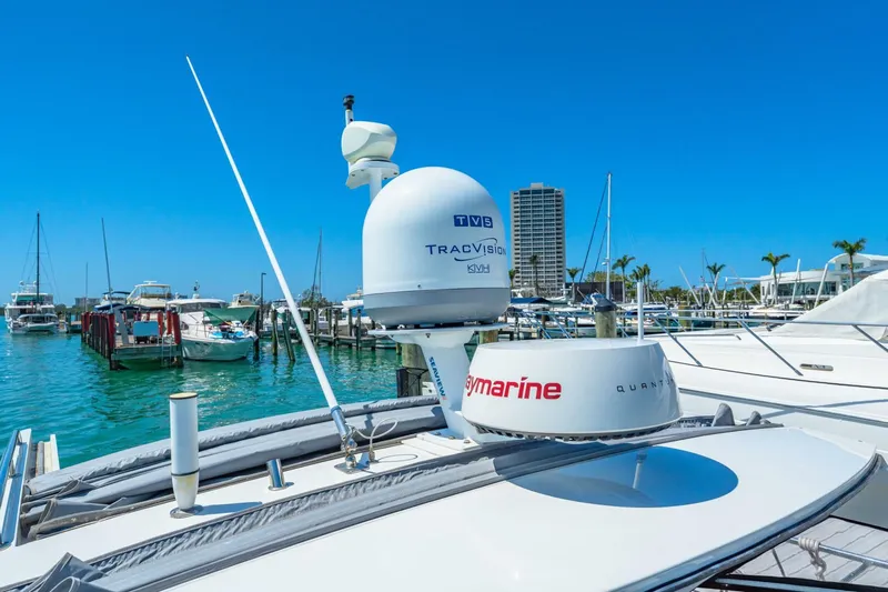  Yacht Photos Pics 2019 Sealine S330V yacht with advanced navigation equipment docked in a marina.