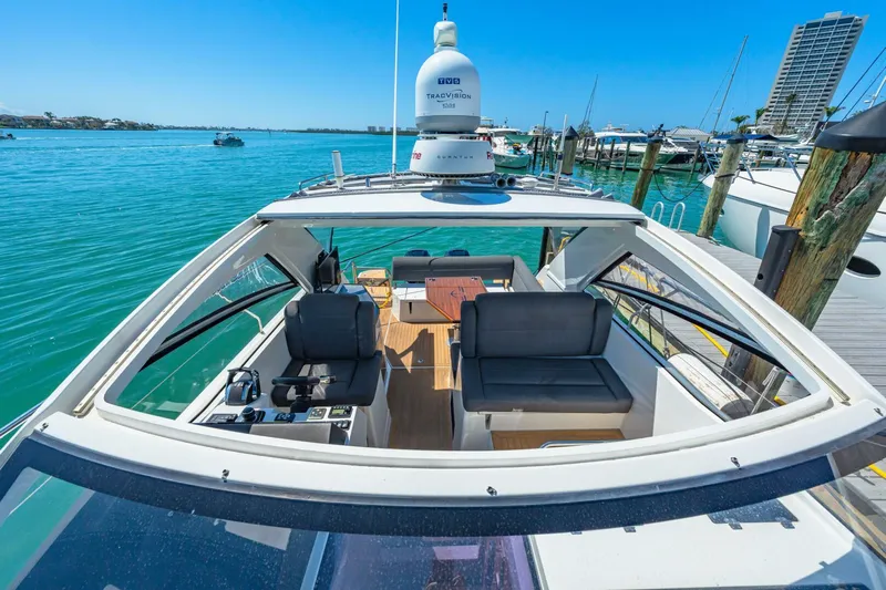  Yacht Photos Pics 2019 Sealine S330V yacht with sleek design, docked in a vibrant marina.
