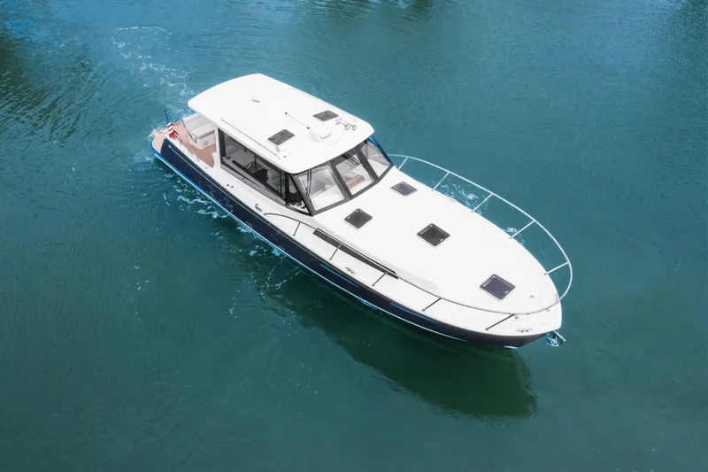 Annabelle IV Yacht Photos Pics 2024 MJM 42 boat cruising on clear blue water.