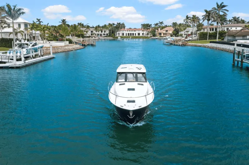 Annabelle IV Yacht Photos Pics 2024 MJM 42 yacht cruising in a scenic, tropical waterfront setting.