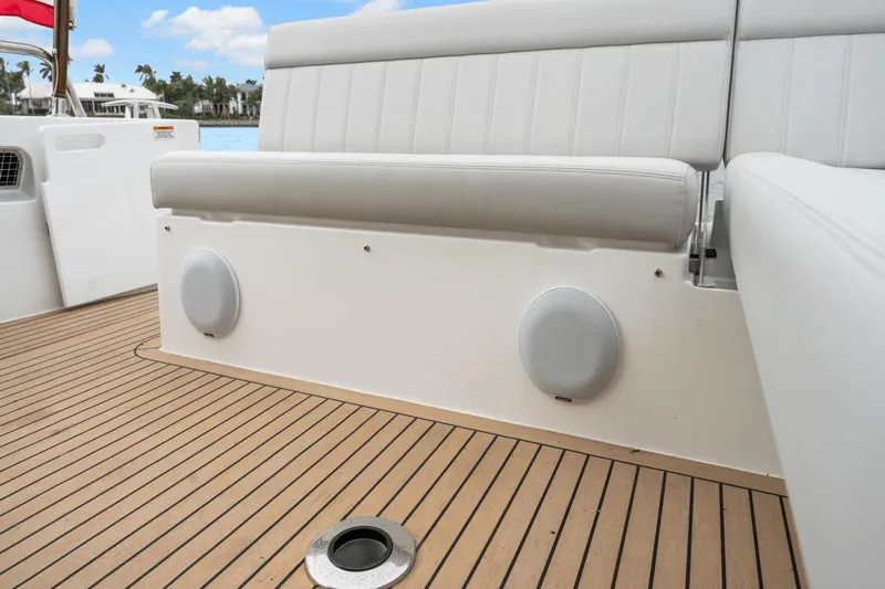 Annabelle IV Yacht Photos Pics 2024 MJM 42 boat interior with cushioned seating and teak flooring.