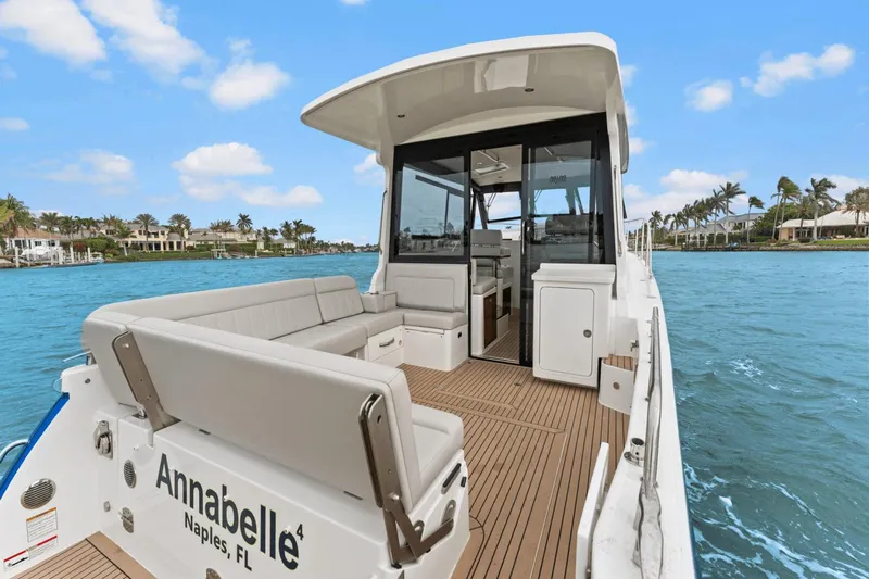 Annabelle IV Yacht Photos Pics 2024 MJM 42 yacht with spacious deck, cruising in sunny coastal waters.