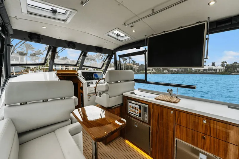 Annabelle IV Yacht Photos Pics Luxurious interior of 2024 MJM 42 yacht with modern amenities and scenic water view.