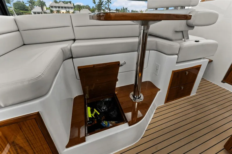 Annabelle IV Yacht Photos Pics 2024 MJM 42 yacht interior with seating, table, and storage compartments.