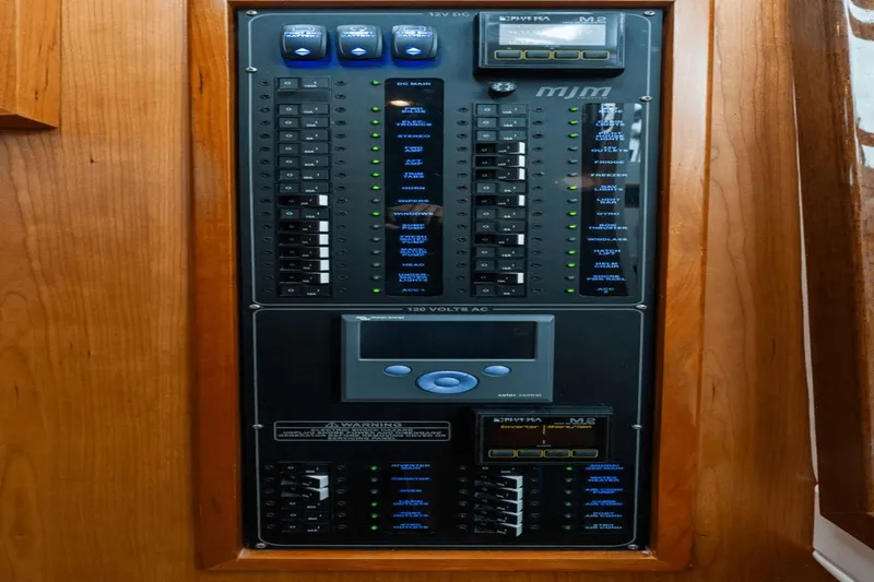 Annabelle IV Yacht Photos Pics Electrical control panel on 2024 MJM 42 boat, featuring switches and indicators.