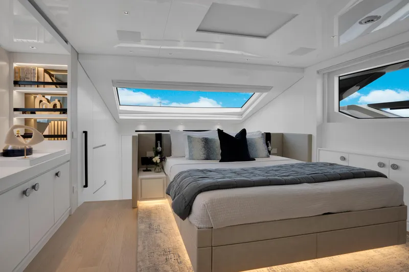 Sweet Virginia Yacht Photos Pics Luxurious 2023 Sanlorenzo SL96A yacht bedroom with skylight and modern decor.