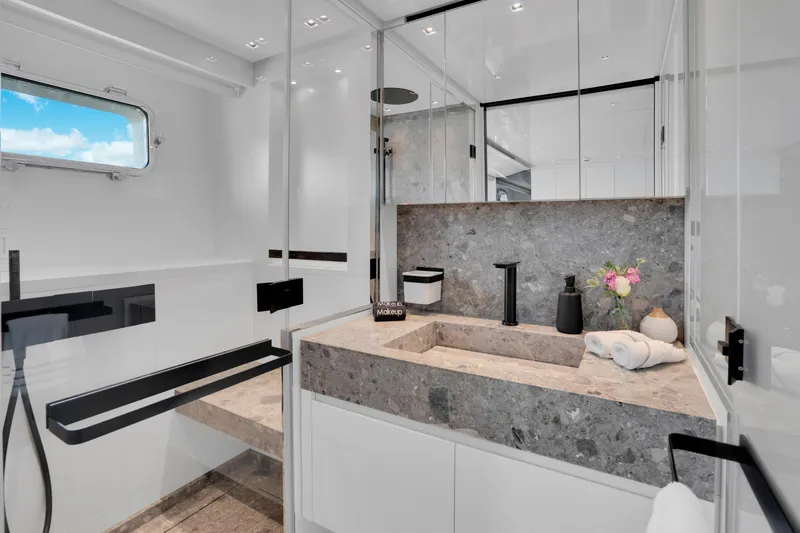 Sweet Virginia Yacht Photos Pics Luxurious bathroom in 2023 Sanlorenzo SL96A yacht with modern fixtures and elegant design.