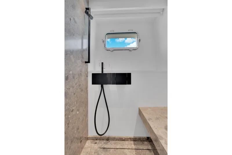 Sweet Virginia Yacht Photos Pics Modern bathroom in 2023 Sanlorenzo SL96A yacht with sleek shower and ocean view.