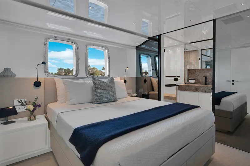 Sweet Virginia Yacht Photos Pics Luxurious bedroom interior of 2023 Sanlorenzo SL96A yacht with modern design and ocean view.