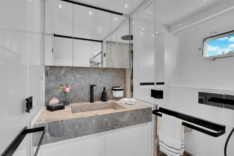 Sweet Virginia Yacht Photos Pics Luxurious bathroom in 2023 Sanlorenzo SL96A yacht with modern fixtures and elegant design.
