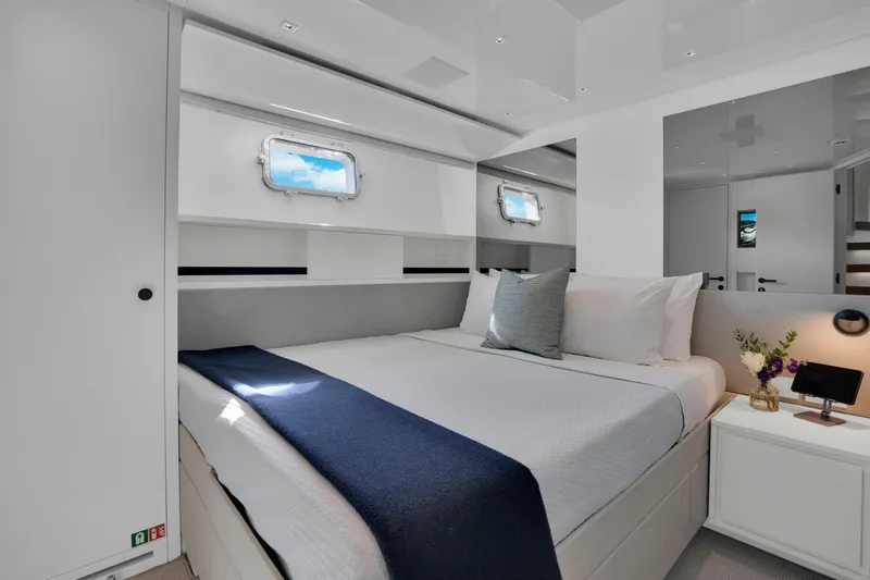 Sweet Virginia Yacht Photos Pics Luxurious bedroom interior of 2023 Sanlorenzo SL96A yacht with modern design and elegant decor.
