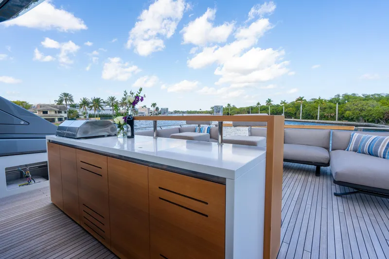Sweet Virginia Yacht Photos Pics Luxurious 2023 Sanlorenzo SL96A yacht deck with modern outdoor kitchen and seating area.