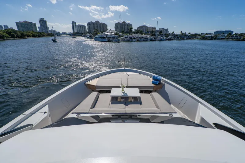 Sweet Virginia Yacht Photos Pics Luxurious 2023 Sanlorenzo SL96A yacht cruising in a scenic urban waterway.