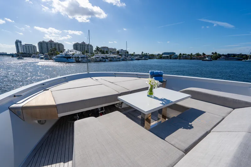 Sweet Virginia Yacht Photos Pics Luxurious 2023 Sanlorenzo SL96A yacht with elegant deck seating and scenic waterfront view.
