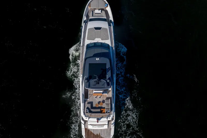 Sweet Virginia Yacht Photos Pics Aerial view of 2023 Sanlorenzo SL96A yacht cruising on dark water.