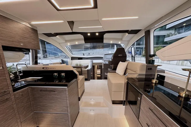  Yacht Photos Pics Luxurious interior of 2025 Cobrey 50 FLY yacht with modern design and elegant furnishings.