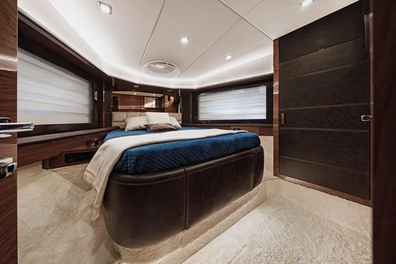  Yacht Photos Pics Luxurious interior of 2025 Cobrey 50 FLY yacht with elegant bedroom design.