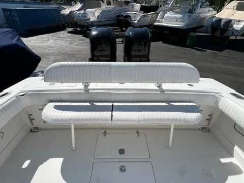  Yacht Photos Pics 2006 Jupiter 31 Center Console boat with dual engines and white seating.