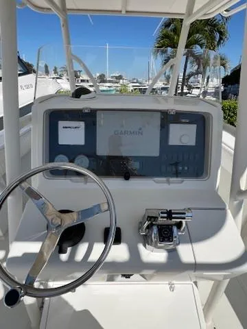  Yacht Photos Pics 2006 Jupiter 31 Center Console boat dashboard with Garmin navigation system.
