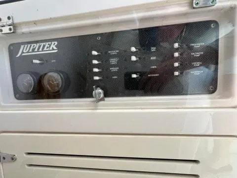  Yacht Photos Pics Control panel of a 2006 Jupiter 31 Center Console boat.