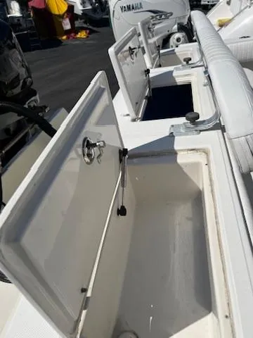  Yacht Photos Pics 2006 Jupiter 31 Center Console boat with open storage compartments.