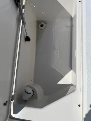  Yacht Photos Pics 2006 Jupiter 31 Center Console storage compartment with hydraulic lift and drainage.