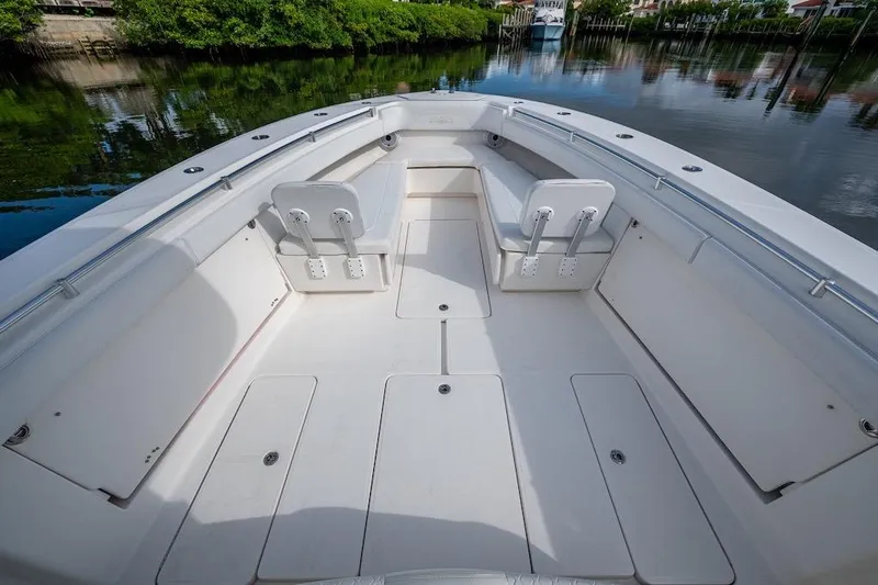  Yacht Photos Pics 2016 Invincible 39 Open Fisherman boat interior with spacious seating and storage compartments.