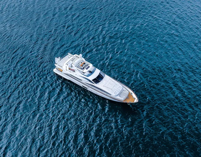 Camy Ed Yacht Photos Pics Aerial view of 2006 Azimut 105 Grande yacht cruising on open water.
