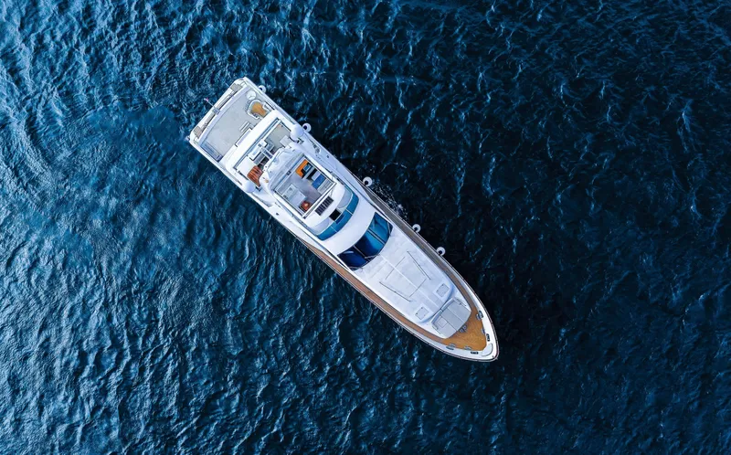 Camy Ed Yacht Photos Pics Aerial view of 2006 Azimut 105 Grande yacht on deep blue ocean.