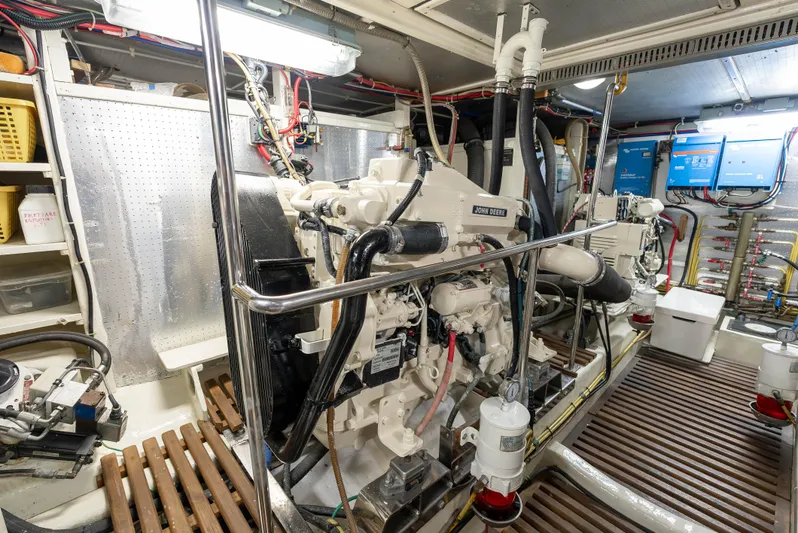 Si Como No Yacht Photos Pics Engine room of 2009 DeFever 45 Motoryacht with John Deere engine and control systems.