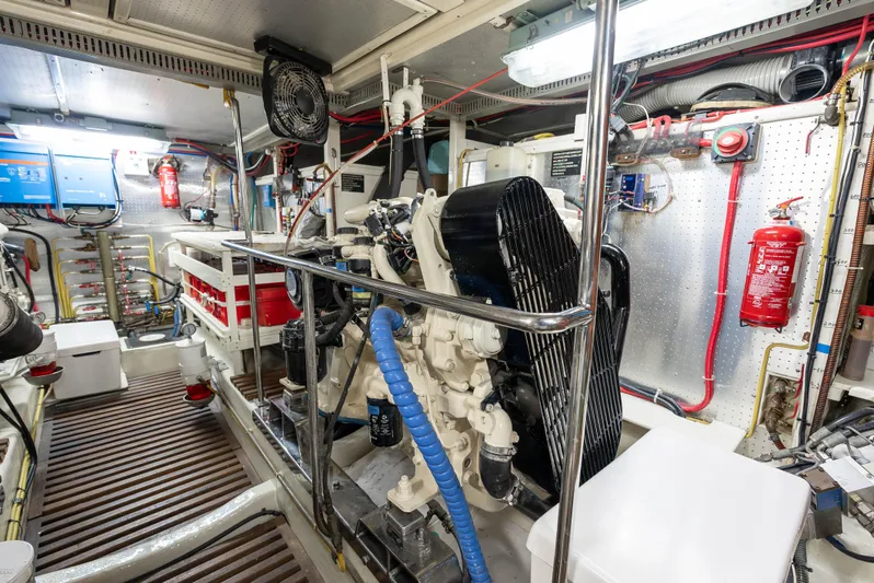 Si Como No Yacht Photos Pics Engine room of 2009 DeFever 45 Motoryacht with equipment and fire safety features.