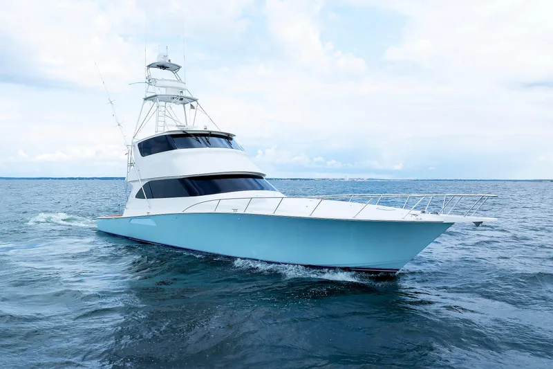 On Ice Yacht Photos Pics 2009 Viking 74 Enclosed Bridge yacht cruising on open water.