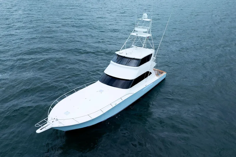 On Ice Yacht Photos Pics 2009 Viking 74 Enclosed Bridge yacht cruising on open water.