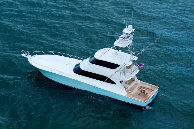 On Ice Yacht Photos Pics 2009 Viking 74 Enclosed Bridge yacht cruising on open water.