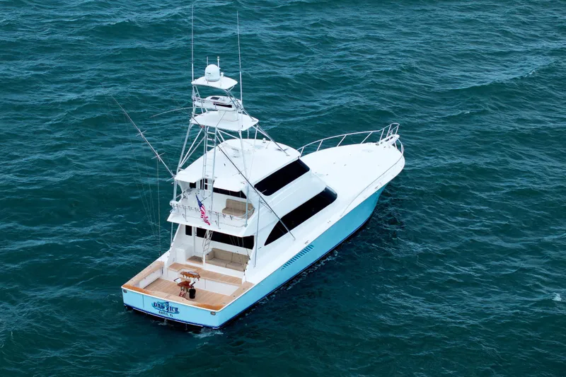 On Ice Yacht Photos Pics 2009 Viking 74 Enclosed Bridge yacht cruising on open sea.