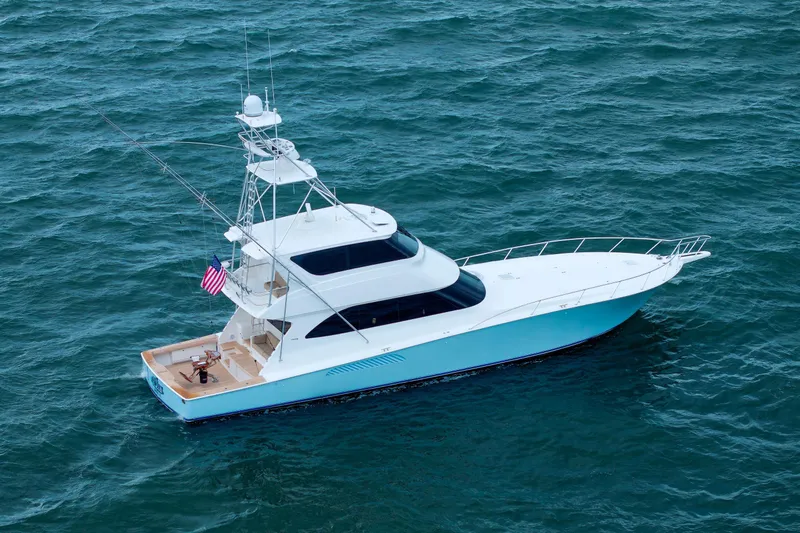 On Ice Yacht Photos Pics 2009 Viking 74 Enclosed Bridge yacht cruising on open water.