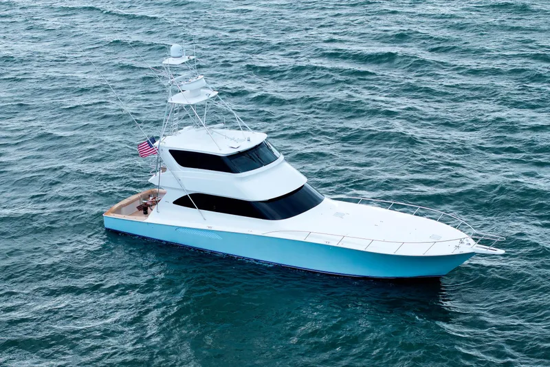 On Ice Yacht Photos Pics 2009 Viking 74 Enclosed Bridge yacht cruising on open water.