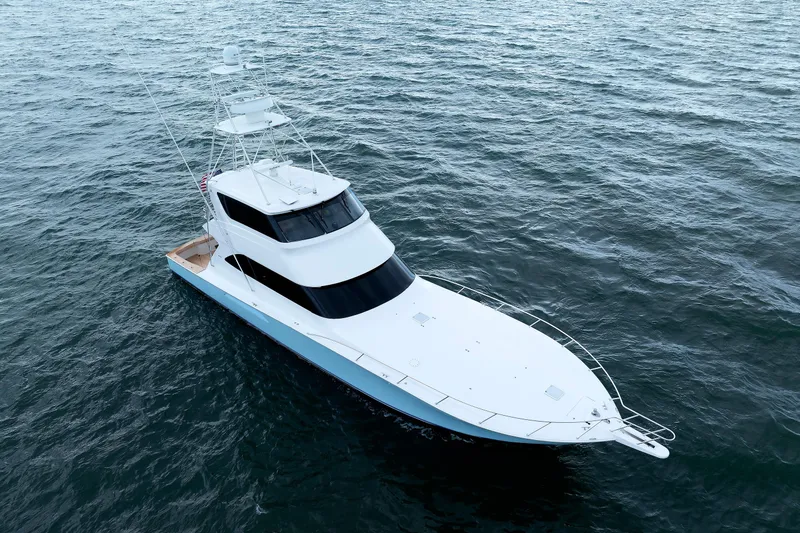 On Ice Yacht Photos Pics 2009 Viking 74 Enclosed Bridge yacht cruising on open water.