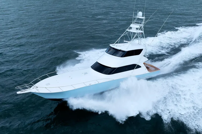 On Ice Yacht Photos Pics 2009 Viking 74 Enclosed Bridge yacht cruising on open water.