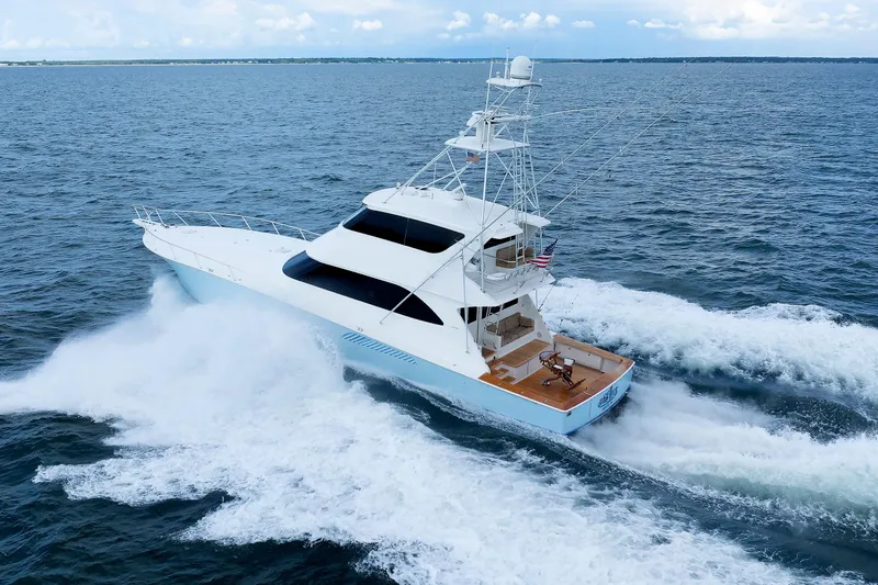 On Ice Yacht Photos Pics 2009 Viking 74 Enclosed Bridge yacht cruising on open water.