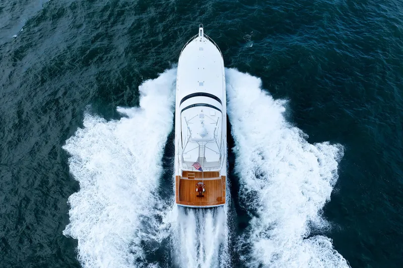 On Ice Yacht Photos Pics Aerial view of 2009 Viking 74 Enclosed Bridge yacht cruising on open water.