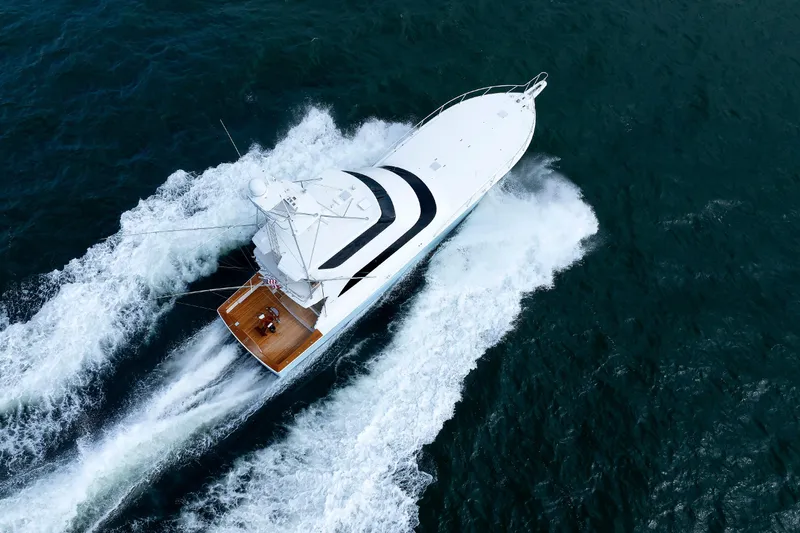 On Ice Yacht Photos Pics Aerial view of 2009 Viking 74 Enclosed Bridge yacht cruising on open water.