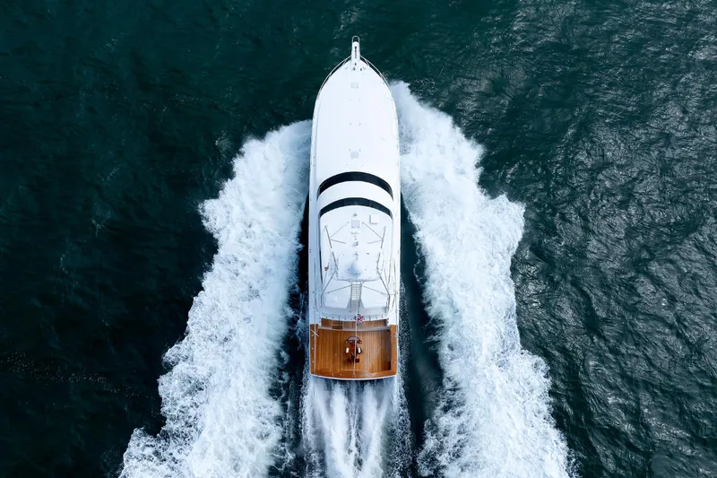 On Ice Yacht Photos Pics Aerial view of 2009 Viking 74 Enclosed Bridge yacht cruising on open water.