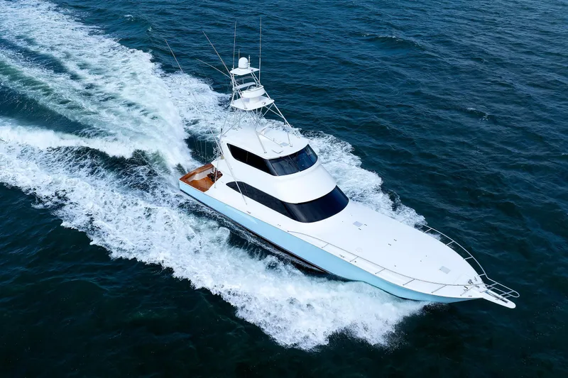 On Ice Yacht Photos Pics 2009 Viking 74 Enclosed Bridge yacht cruising on open water.